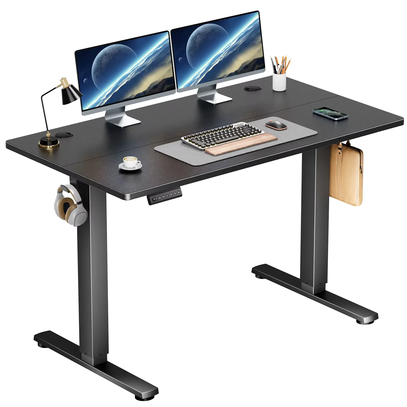Standing desk at various heights with laptop and accessories